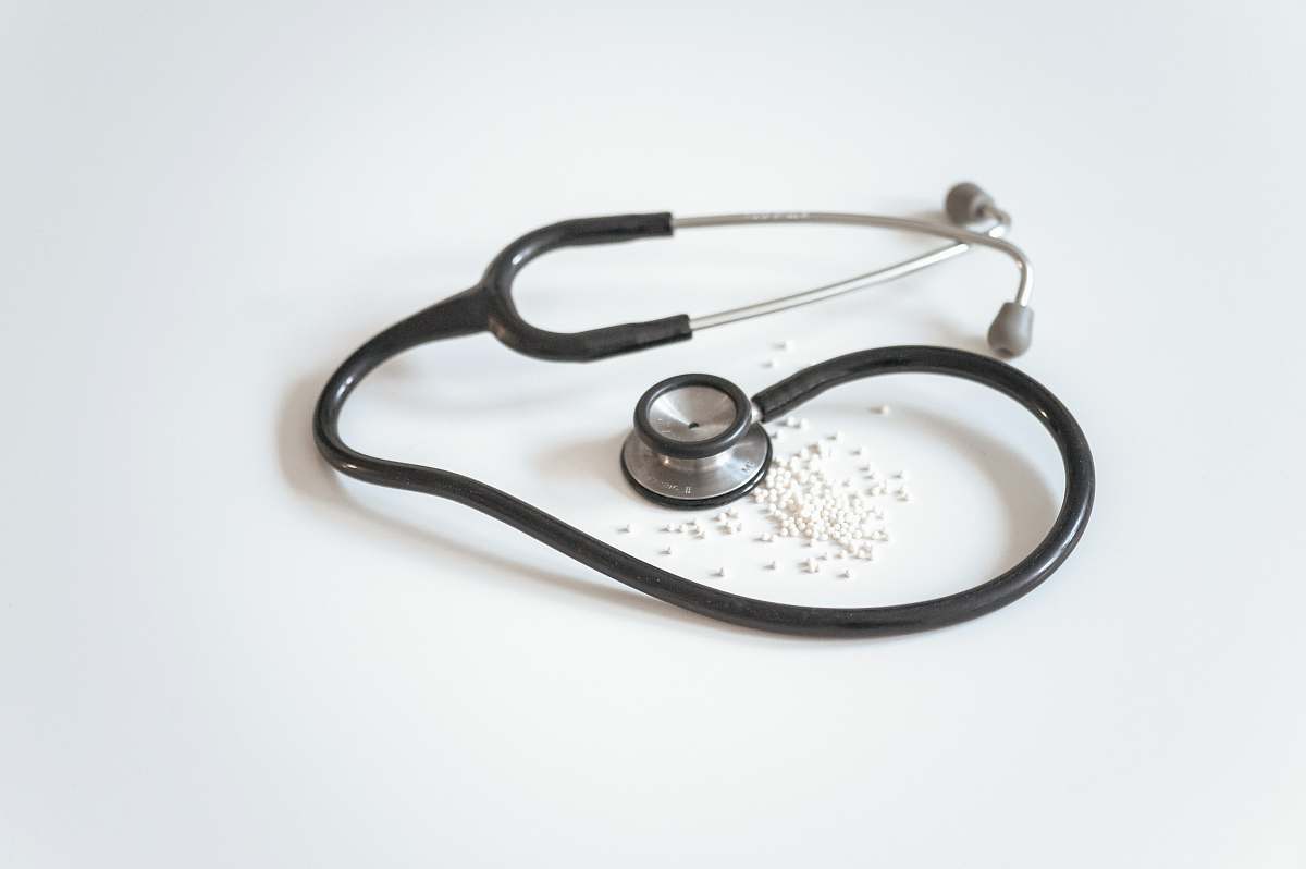 health insurance. black and silver stethoscope on white surface health plan